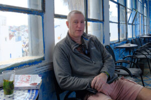 Welsh writer Dave Lewis in Cafe Baba, Tangier, 2023